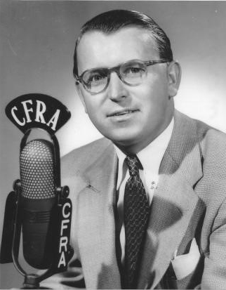 Tom Foley is shown at a CFRA microphone