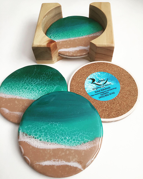 coasters painted with a beach scene