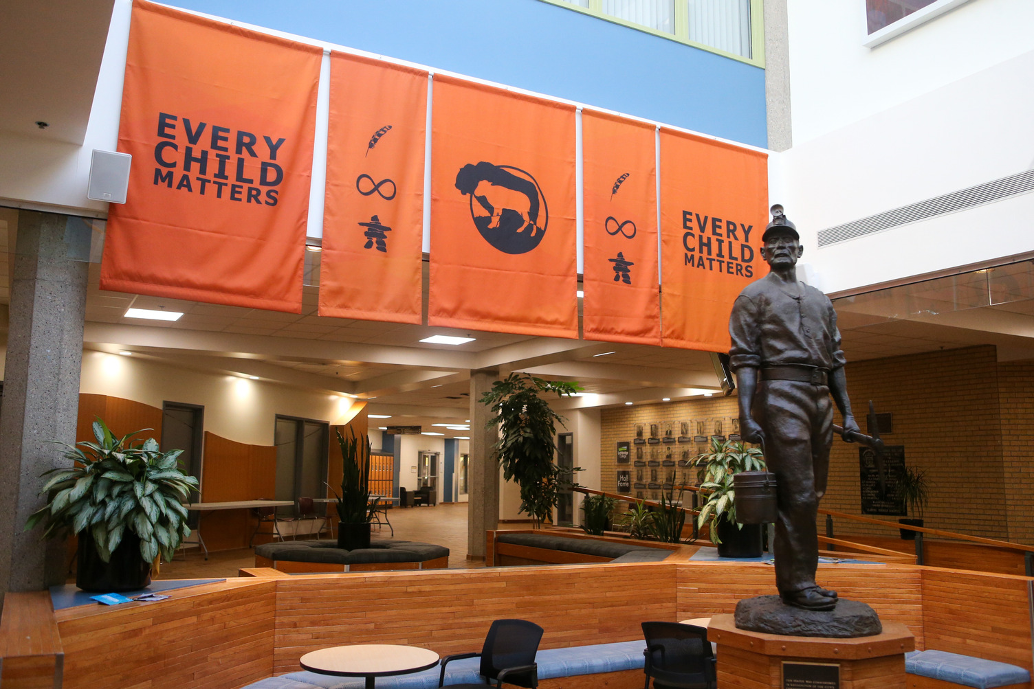 Orange "Every Child Matters" banners hang in Lethbridge College's Centre Core.
