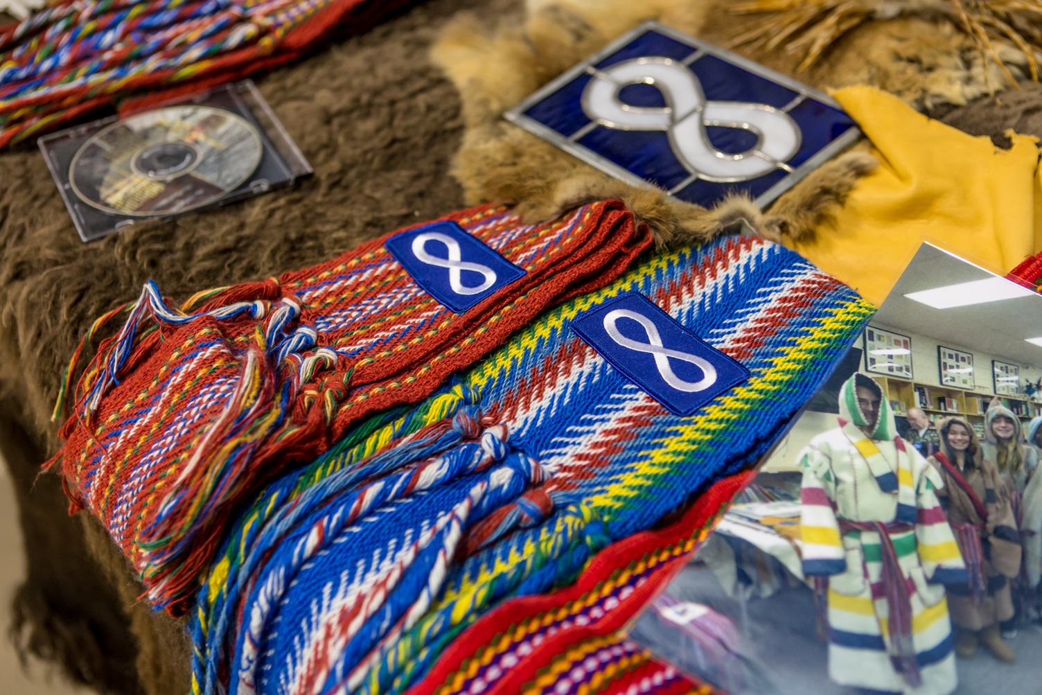 A row of Metis sashes on a table