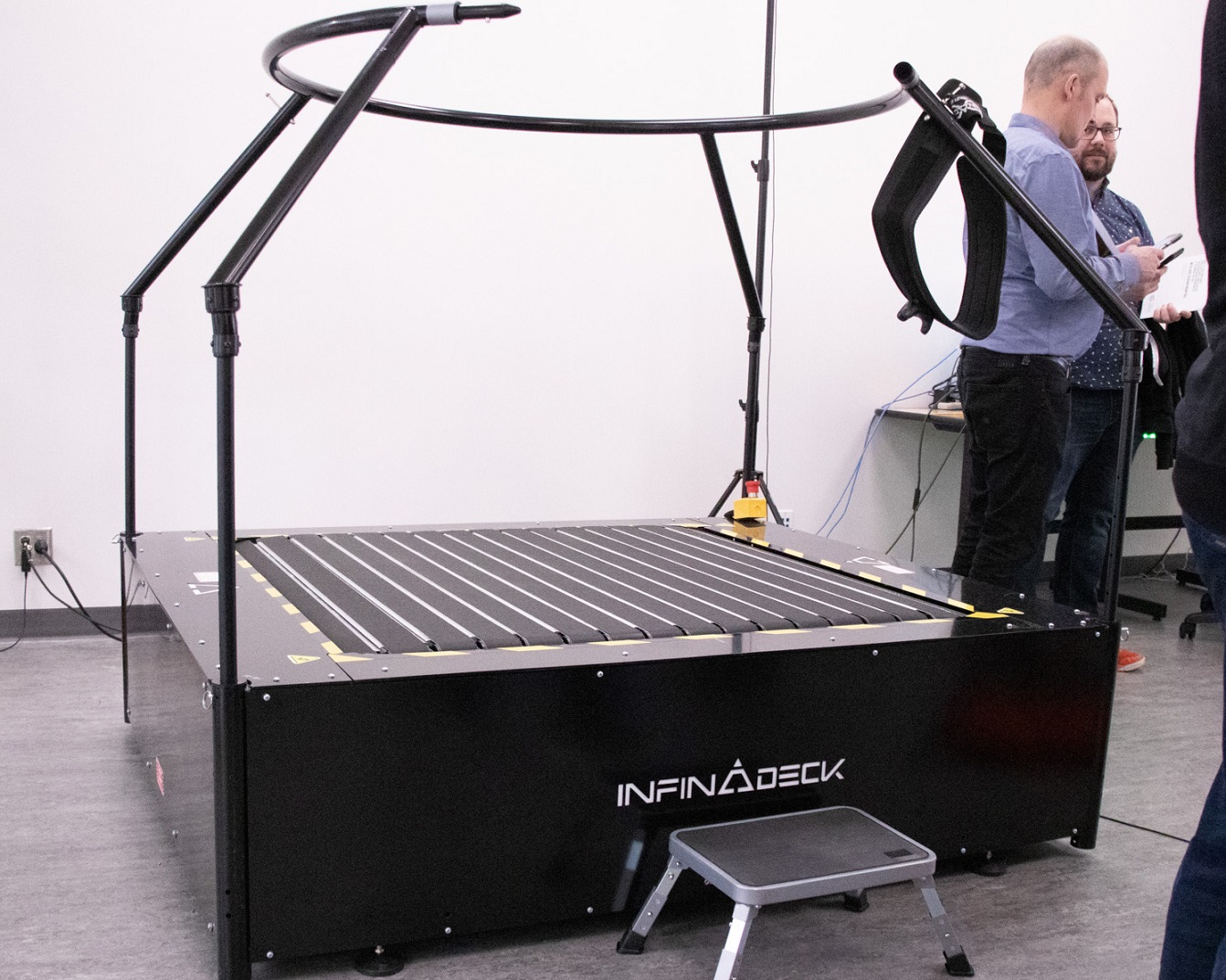 a square treadmill with railing