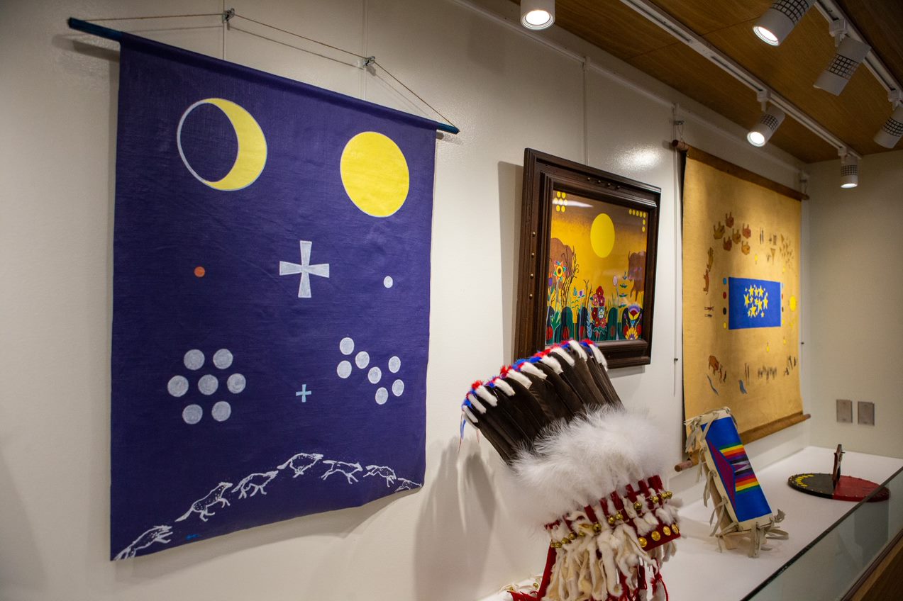 a display of Indigenous textiles and clothing