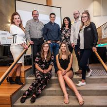 Ashcroft Design Challenge winners Lina Wiebe and Jada Kot pose with instructor Cherie Reitzel and members of Ashcroft Master Builder.