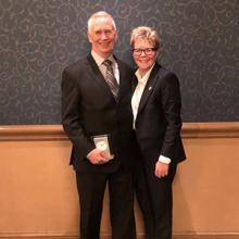 Cal Whitehead with Dr. Paula Burns as Whitehead accepted a Chair's Academy Exemplary Leadership Award