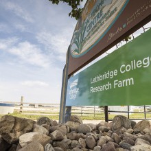 a sign for the Lethbridge College Research Farm