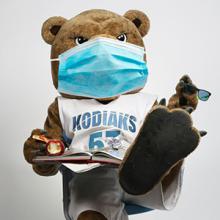 Lethbridge College mascot Kodi models a non-medical mask.