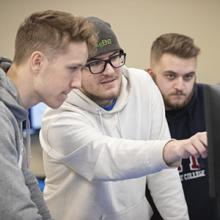 Computer Information Technology students work in a lab in early 2020.