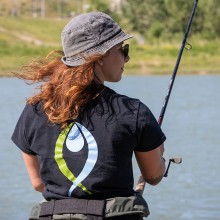 Fourth year Ecosystem Management student Abigail Doerksen fishes for sturgeon as part of a Lethbridge College research project.