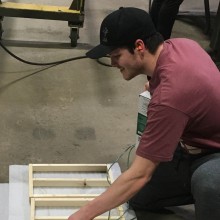 Civil Engineering Technology alumni Jordan Dyck prepares a window as part of his team's nationally-recognized Technology Report assignment.