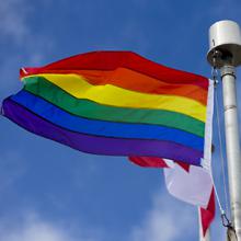 The Pride Flag flies outside of Lethbridge College