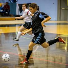The Kodiaks Tiffany Rizko moves the ball upcourt in futsal action